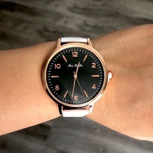 Women’s white/ rose gold watch